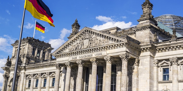 Reichstag building German Parliament with flags
