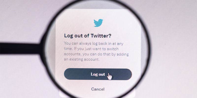 Log out of Twitter on screen "You can always log back in at any time. If you just want to switch accounts, you can do that by adding an existing account. Log out Cancel" with magnifying glass