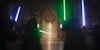 four jedi holding their lightsabers during a scene in the mandalorian season 3