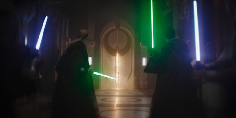 four jedi holding their lightsabers during a scene in the mandalorian season 3