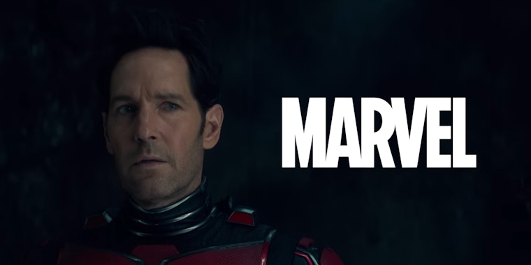 Paul Rudd Ant Man still in Marvel Studios’ Ant-Man and The Wasp: Quantumania with Marvel logo to his right
