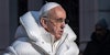 Pope wearing puffy white jacket