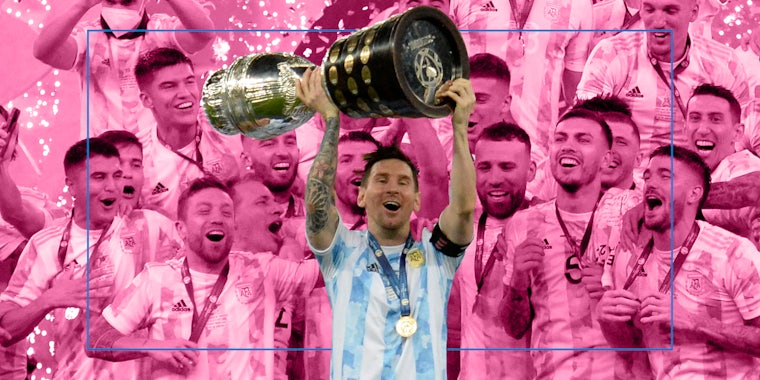 Argentina's Lionel Messi holds the trophy as he celebrates with teammates after beating 1-0 Brazil in the Copa America final soccer match at the Maracana stadium in Rio de Janeiro, Brazil