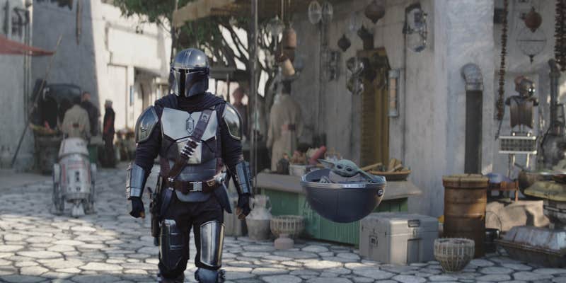 din djarin (left) and grogu (right) in the mandalorian