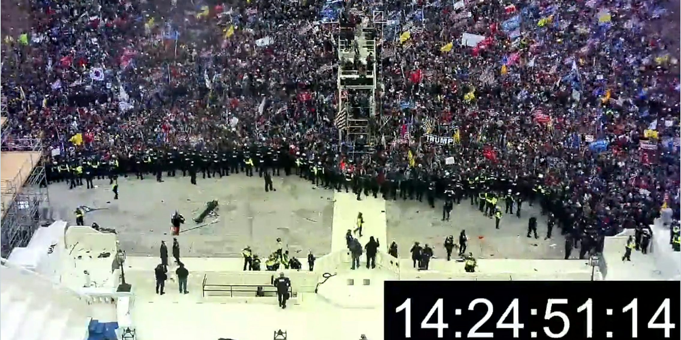 crowd rushing capital with 14:24:51:14 timestamp in bottom right corner