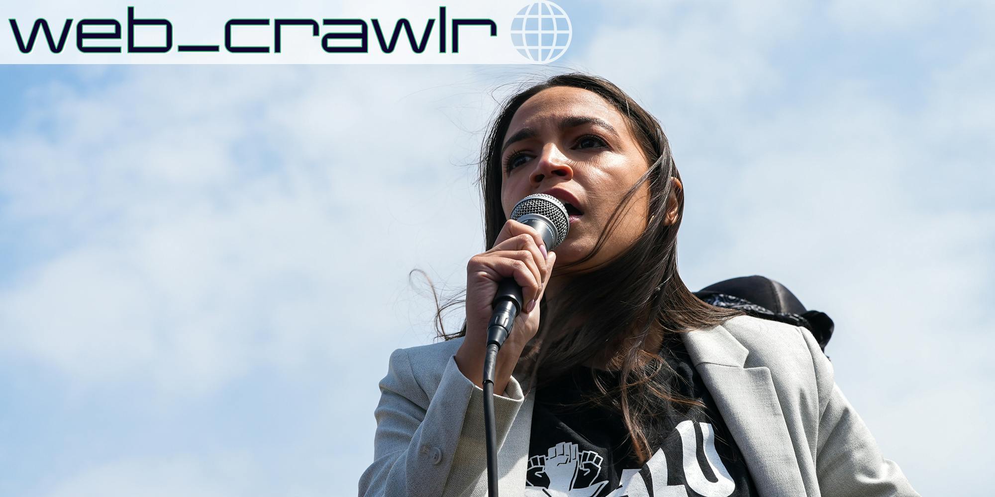 Rep. Alexandria Ocasio-Cortez speaking into a microphone. The Daily Dot newsletter web_crawlr logo is in the top left corner.