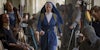 a nun in a blue outfit walking quickly in the tv show mrs. davis