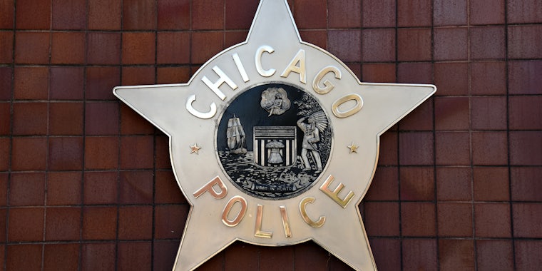 Chicago Police star sign on brown square wall
