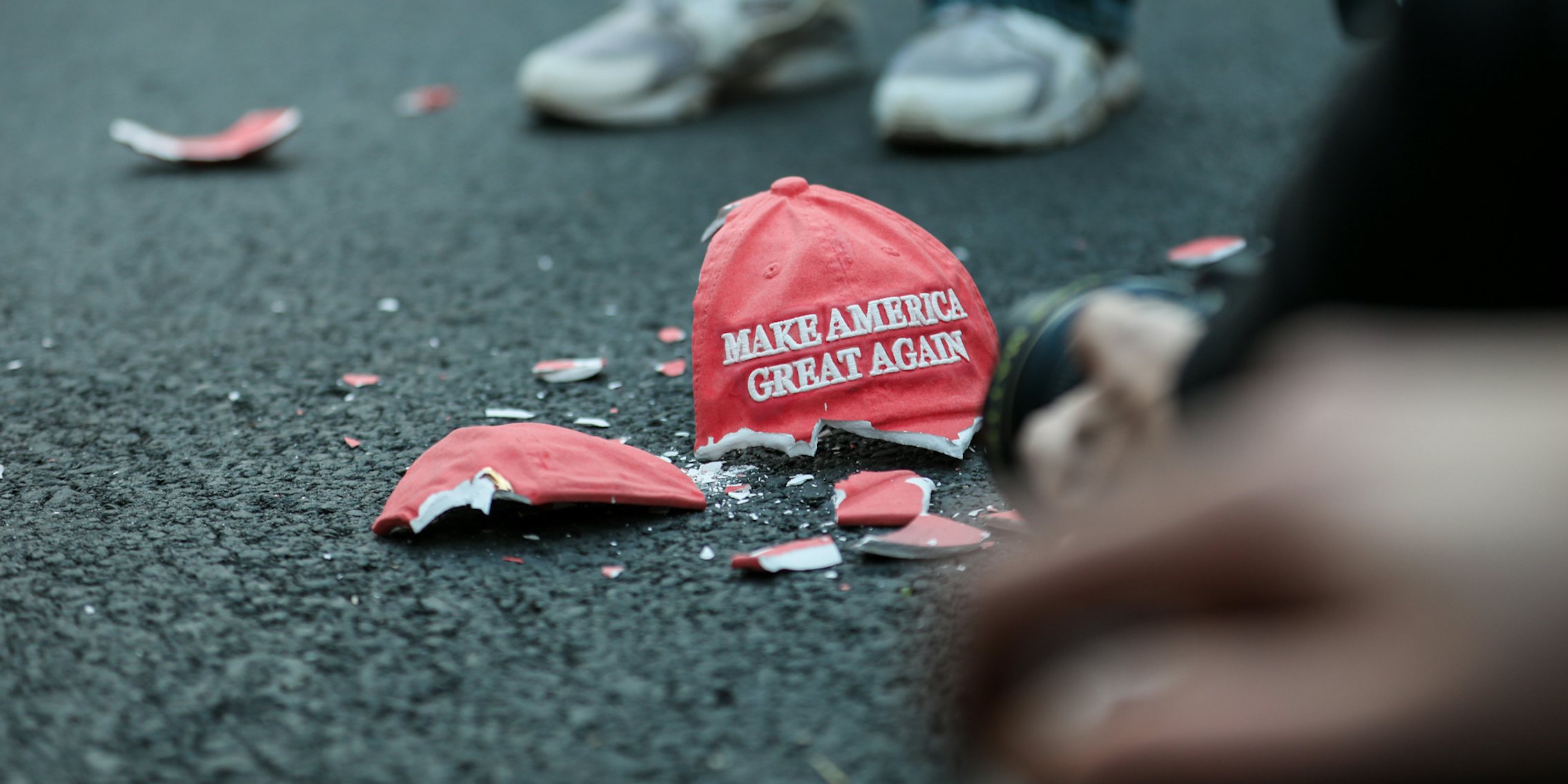 MAGA hat broken on ground