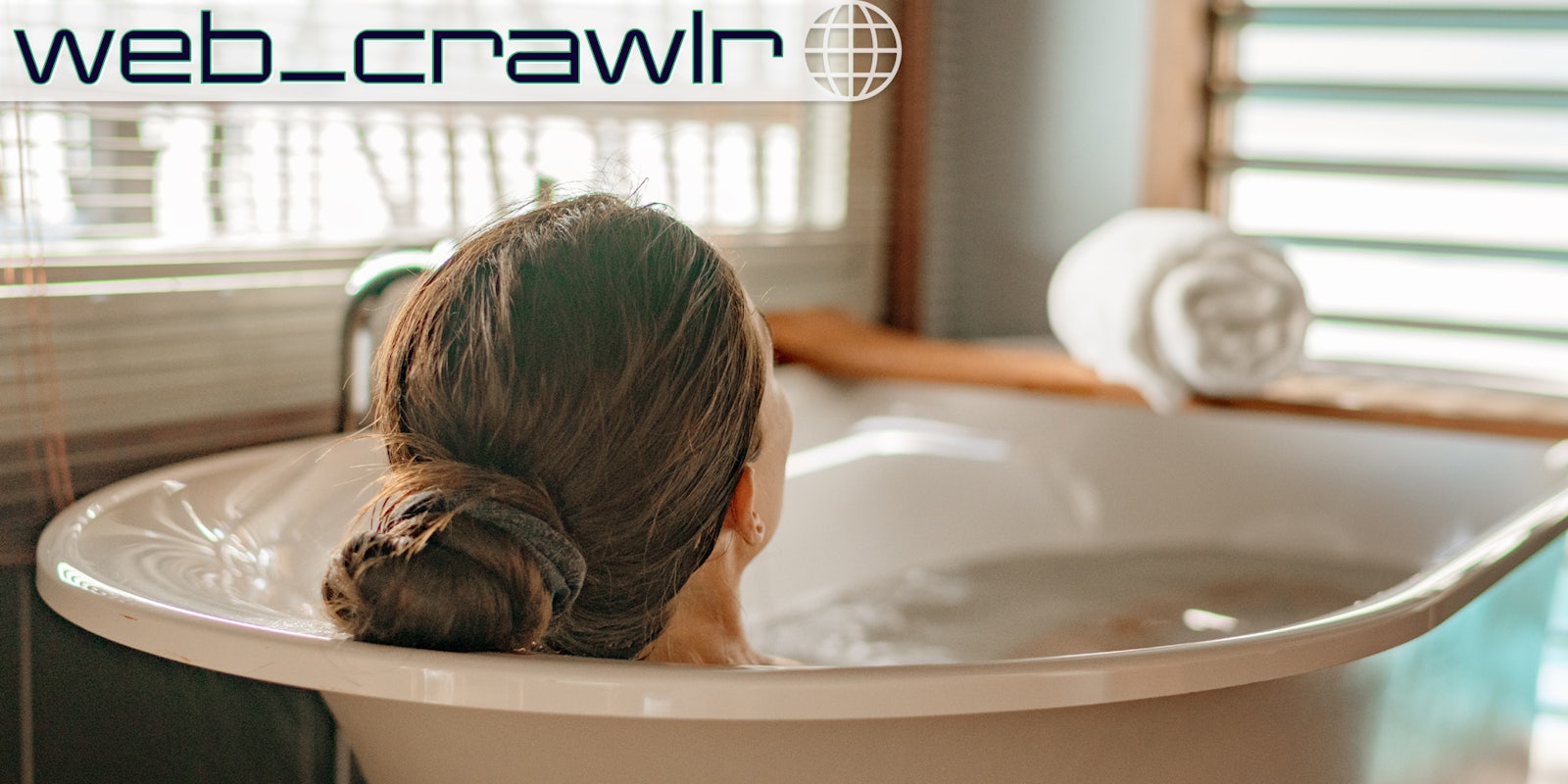 A woman in a bathtub. The Daily Dot newsletter web_crawlr logo is in the top left corner.