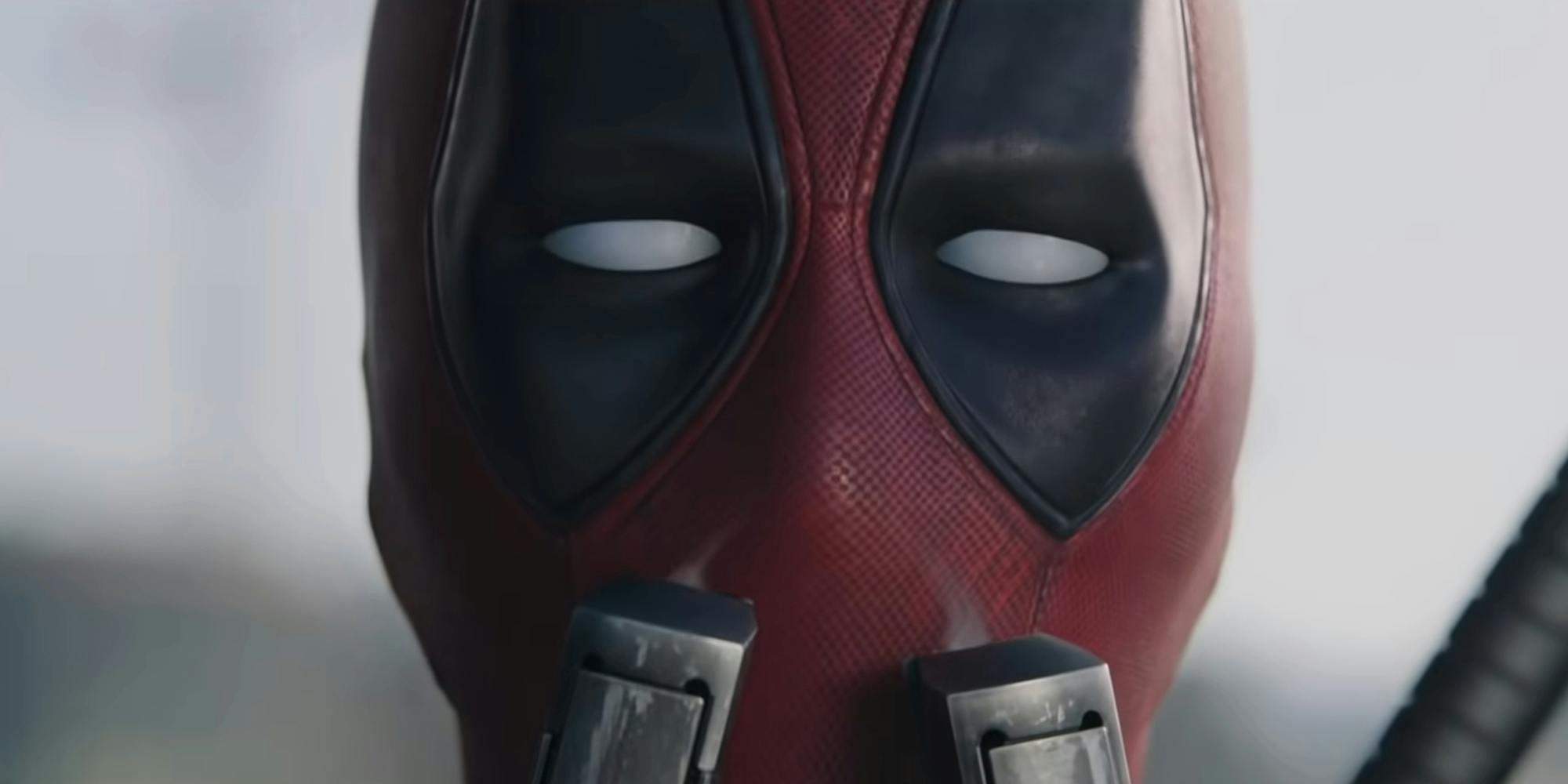 Deadpool sniffing guns in Deadpool