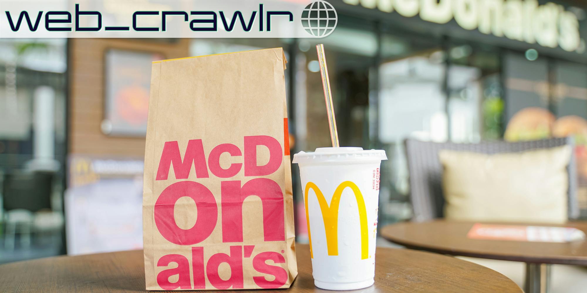 A McDonald's order on a table. The Daily Dot newsletter web_crawlr logo is in the top left corner.