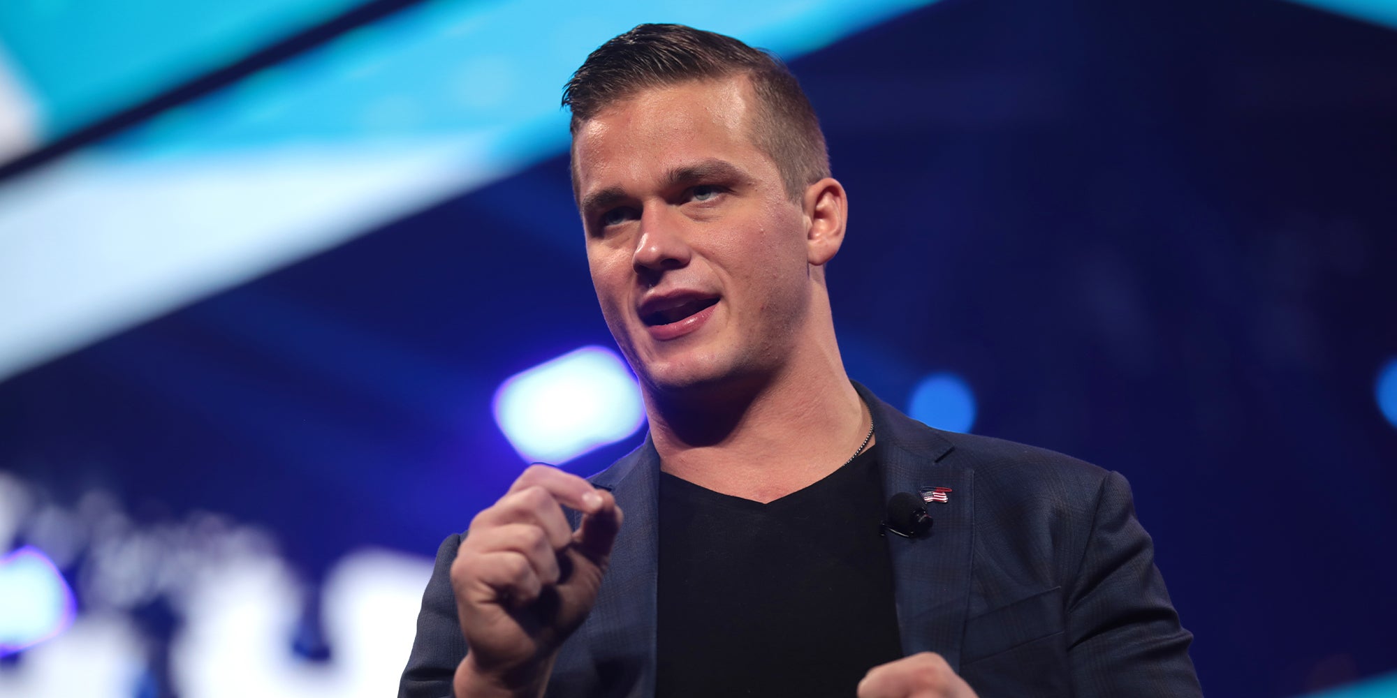 U.S. Congressman Madison Cawthorn speaking with attendees