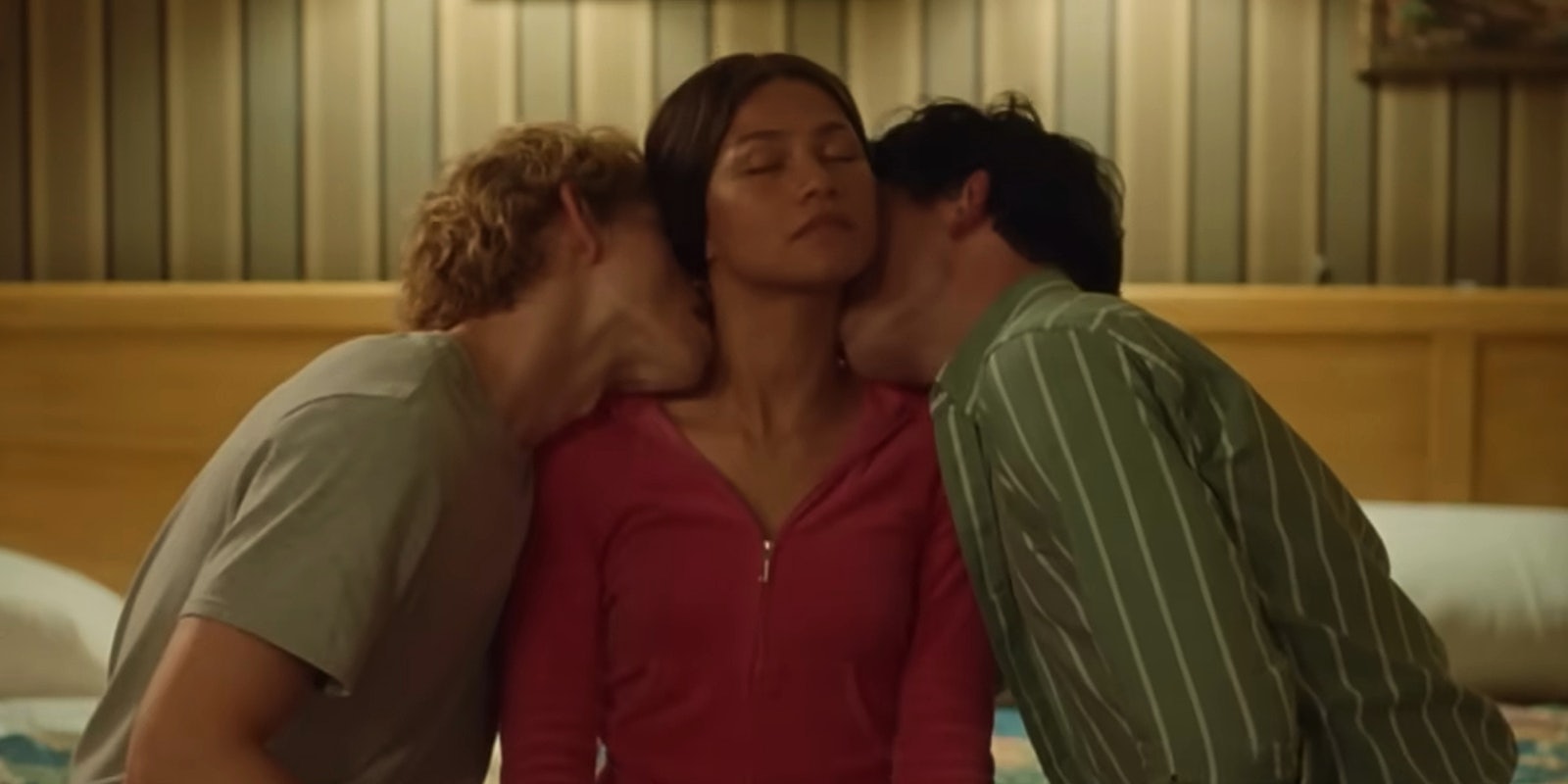 Challengers scene Zendaya being kissed on the neck by Josh O’Connor, and Mike Faist