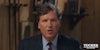 Tucker Carlson speaking in front of blurry brown background during Tucker On Twitter Ep. 1
