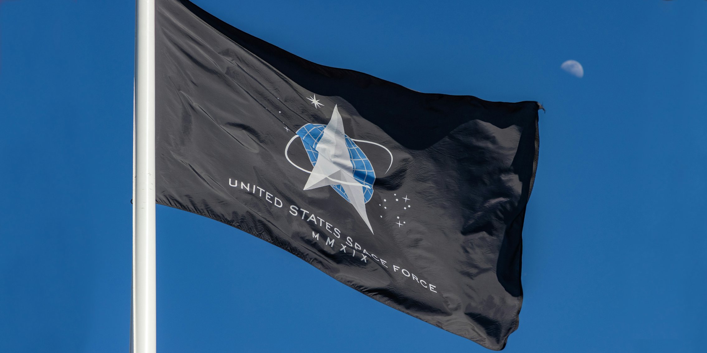 United States Space Force flag in front of blue sky
