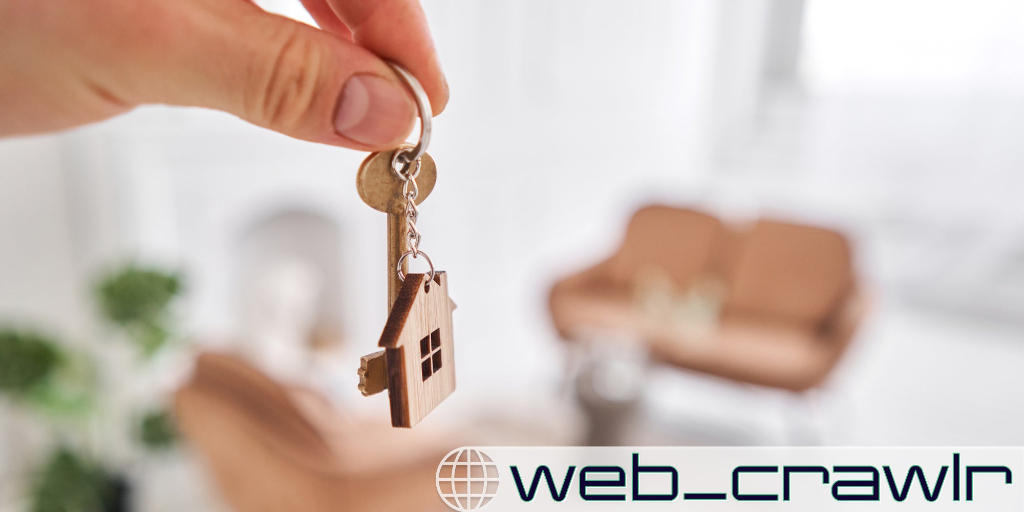 A person holding a key. The Daily Dot newsletter web_crawlr logo is in the bottom right corner.