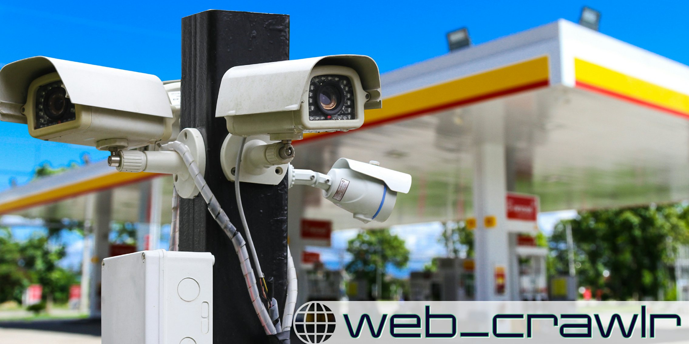 Cameras at a gas station. The Daily Dot newsletter web_crawlr logo is in the bottom right corner.