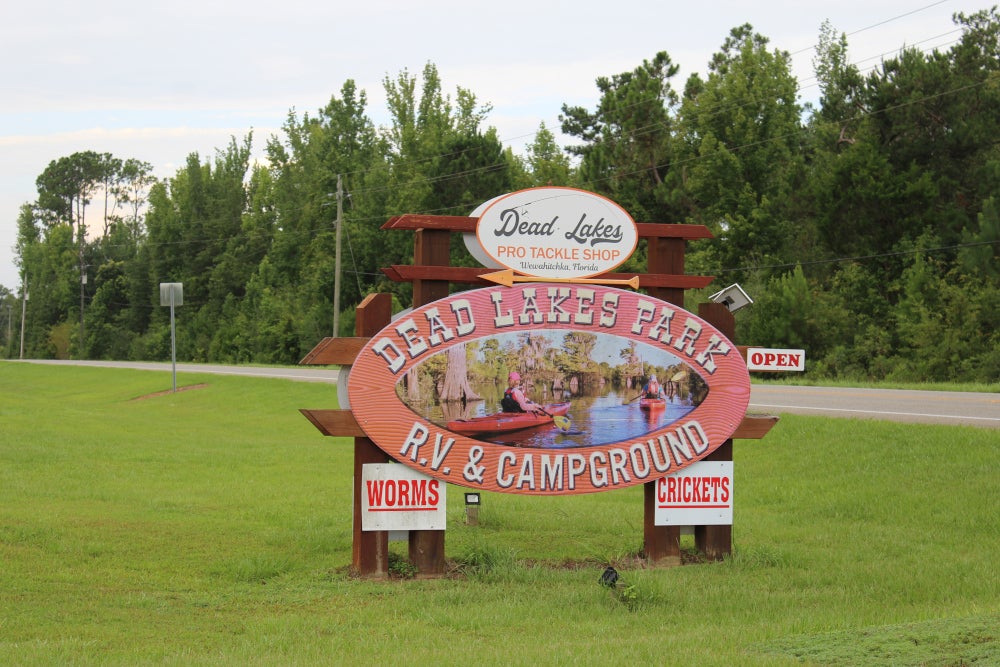 dead lakes campground with signs for crickets and worms