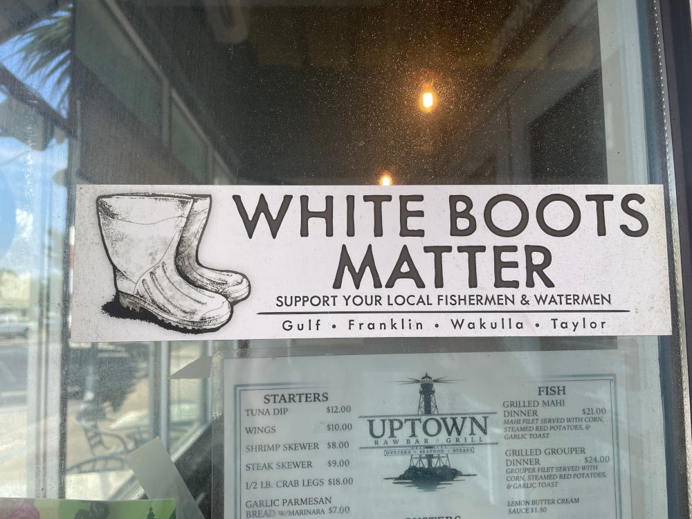 florida sign that says white boots matter