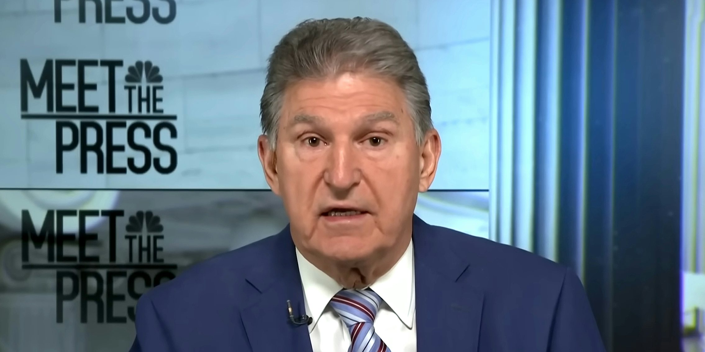 Joe Manchin speaking in front of blue background during Meet the Press on NBC News