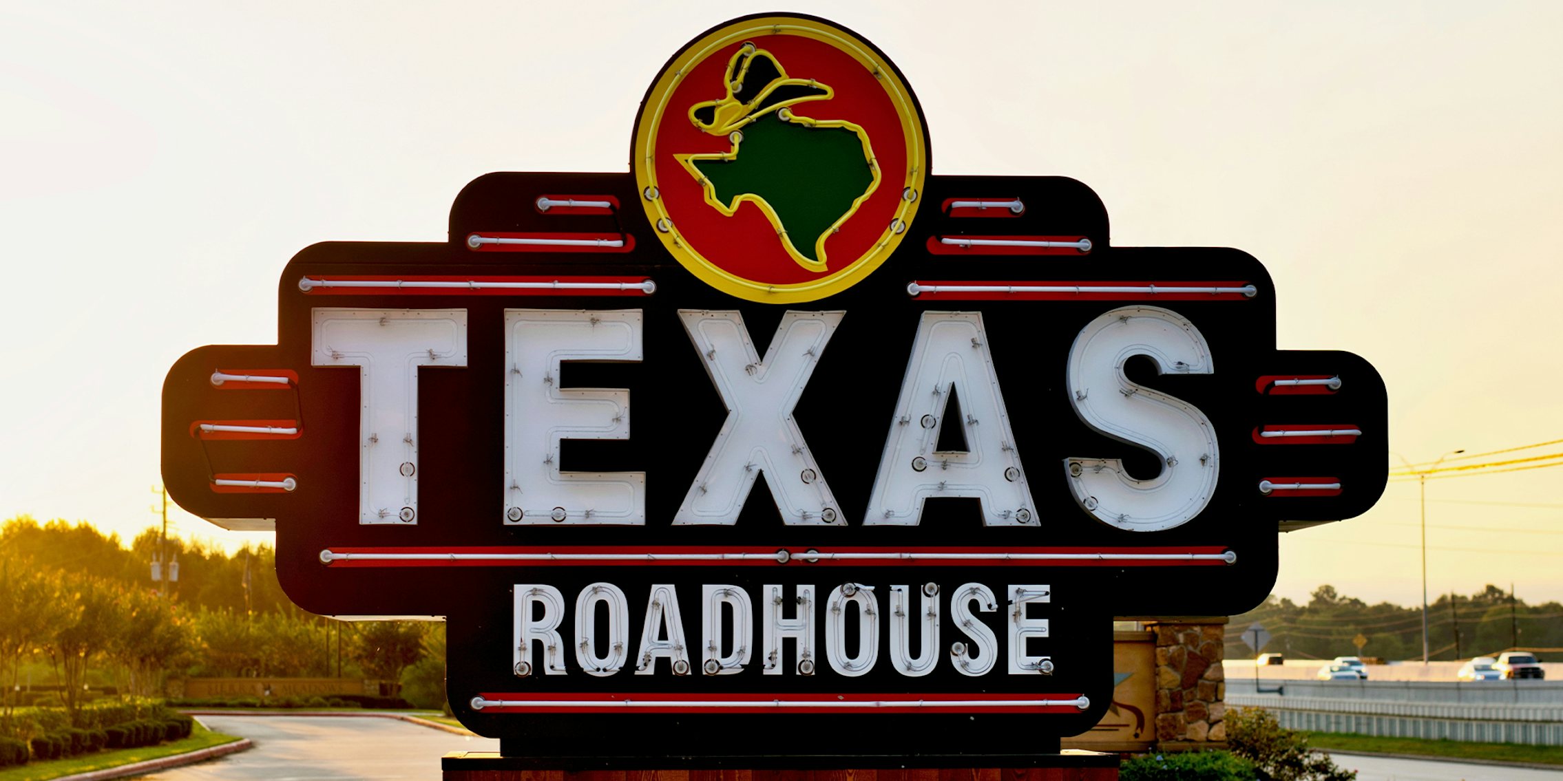 Texas Roadhouse restaurant sign on a freeway in Humble, Texas.