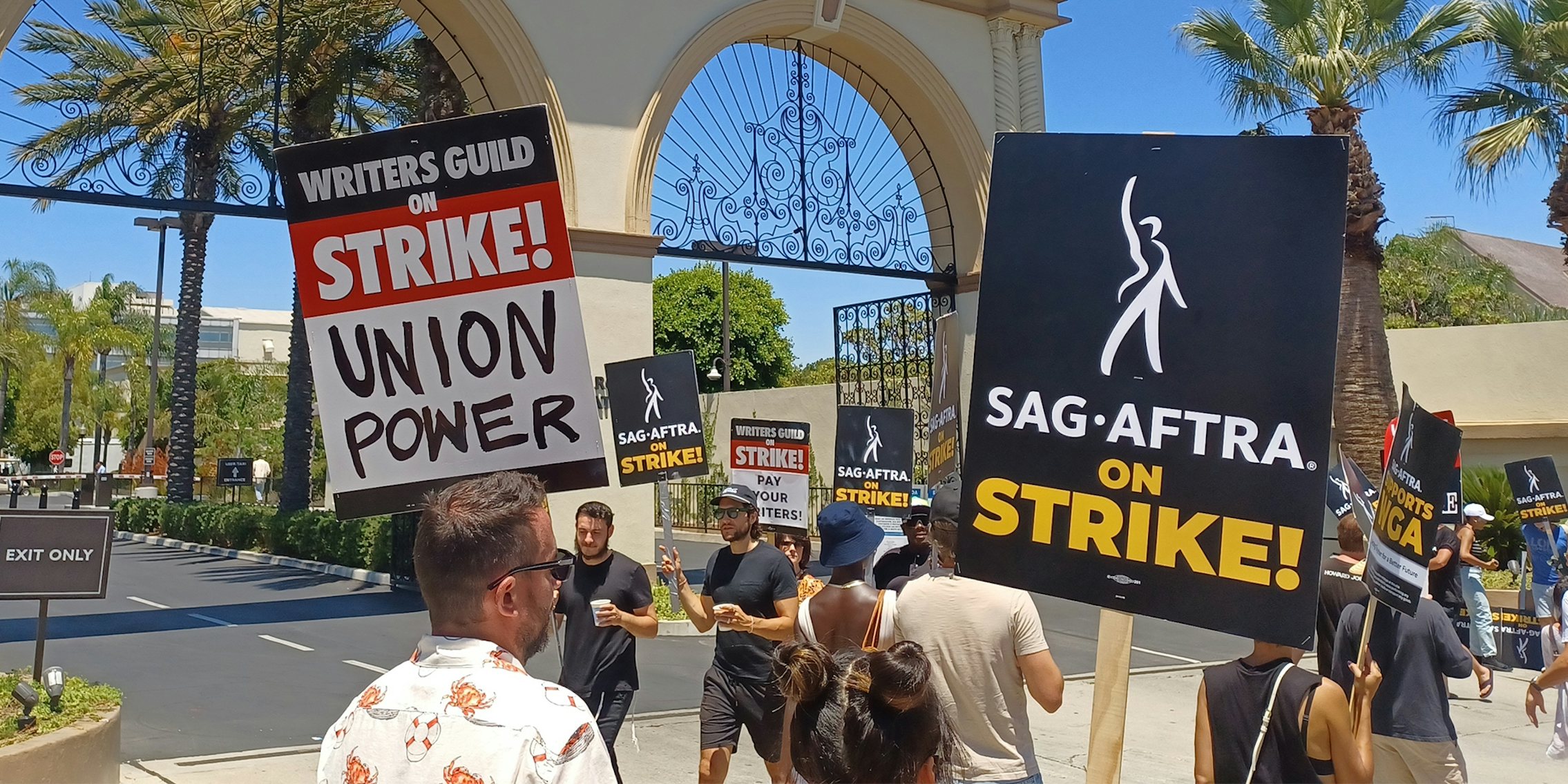 Striking WGA and SAG AFTRA members picket in front of Paramount Pictures in Hollywood