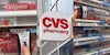 Customer rings button at CVS to get toothpaste, soap that are behind locked shelves