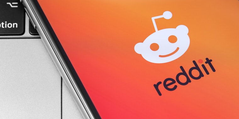 Reddit logo on the screen smartphone.
