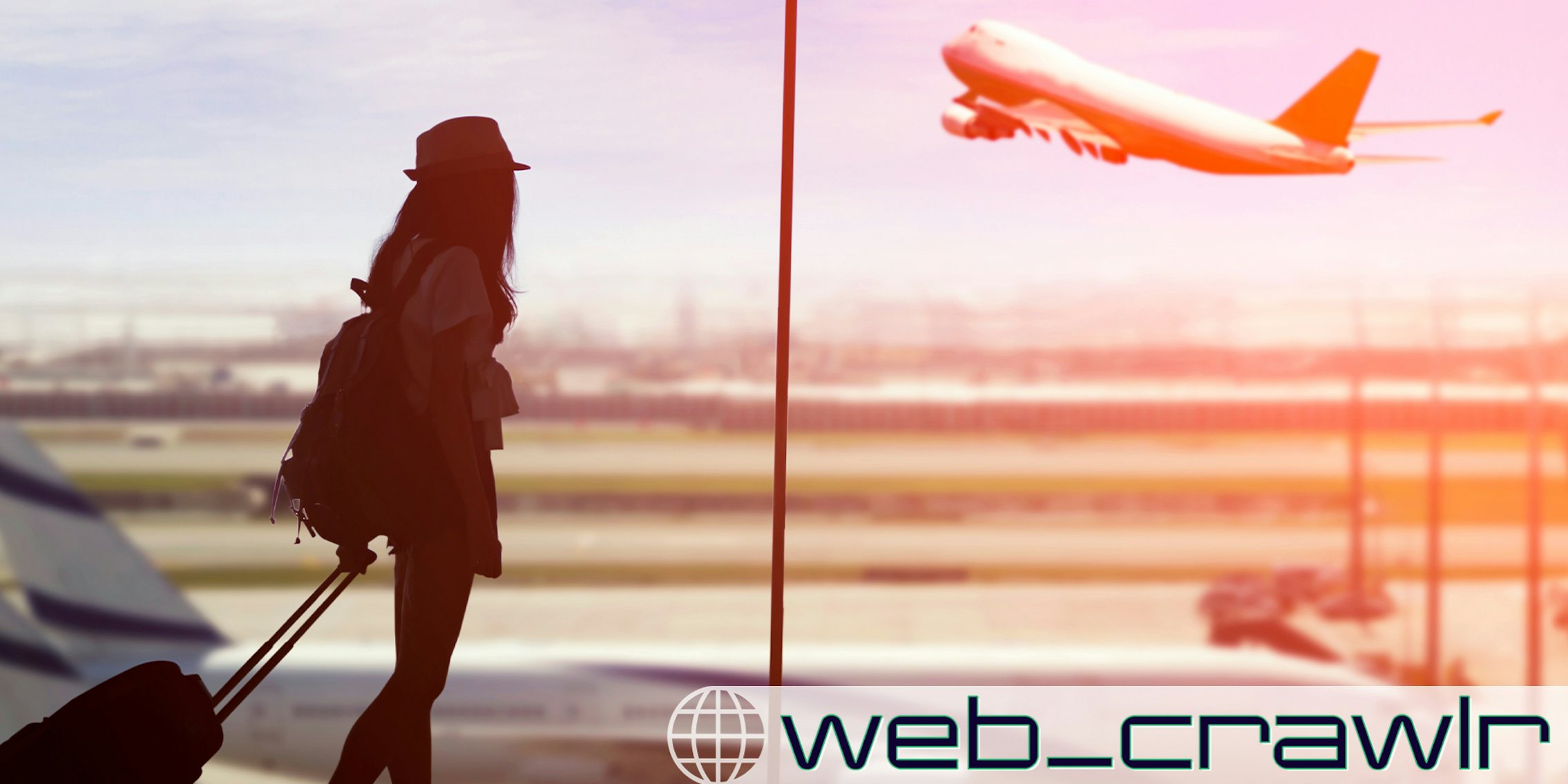 Young woman is standing near window at the airport and watching plane before departure.