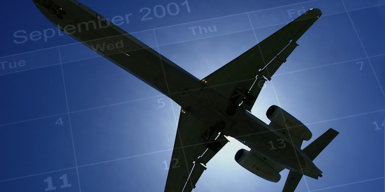 September 2001 calendar over image of plane in sky