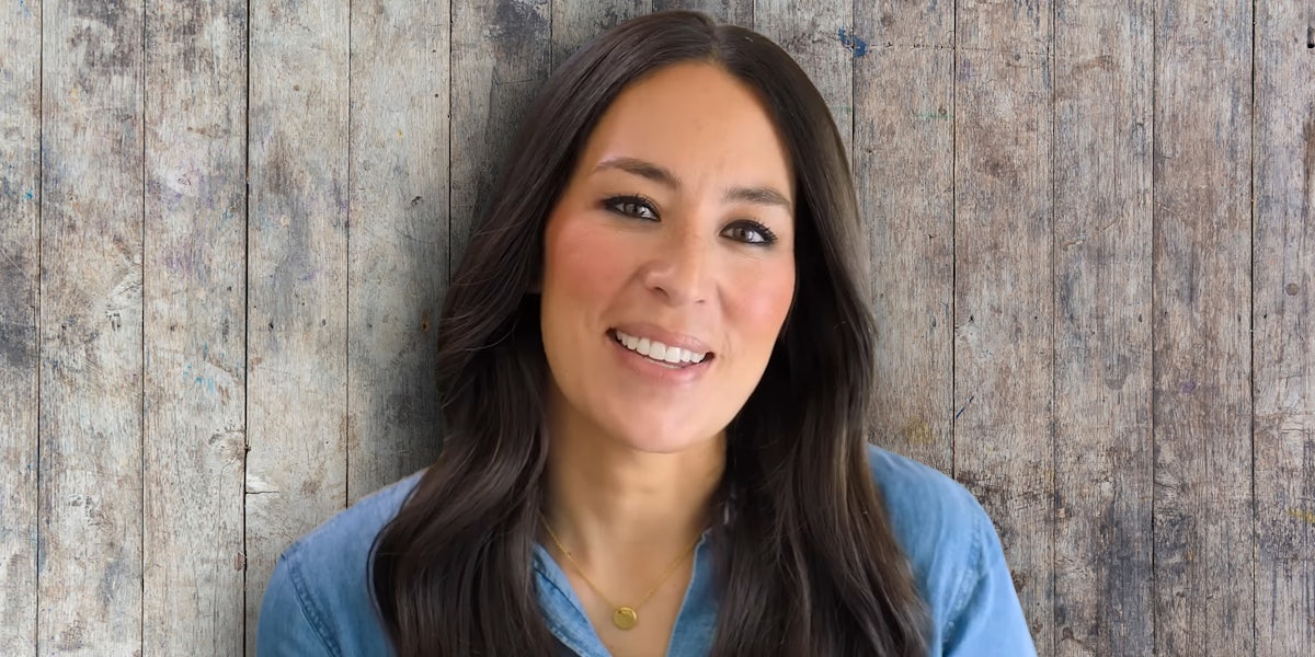 Joanna Gaines with shiplap background