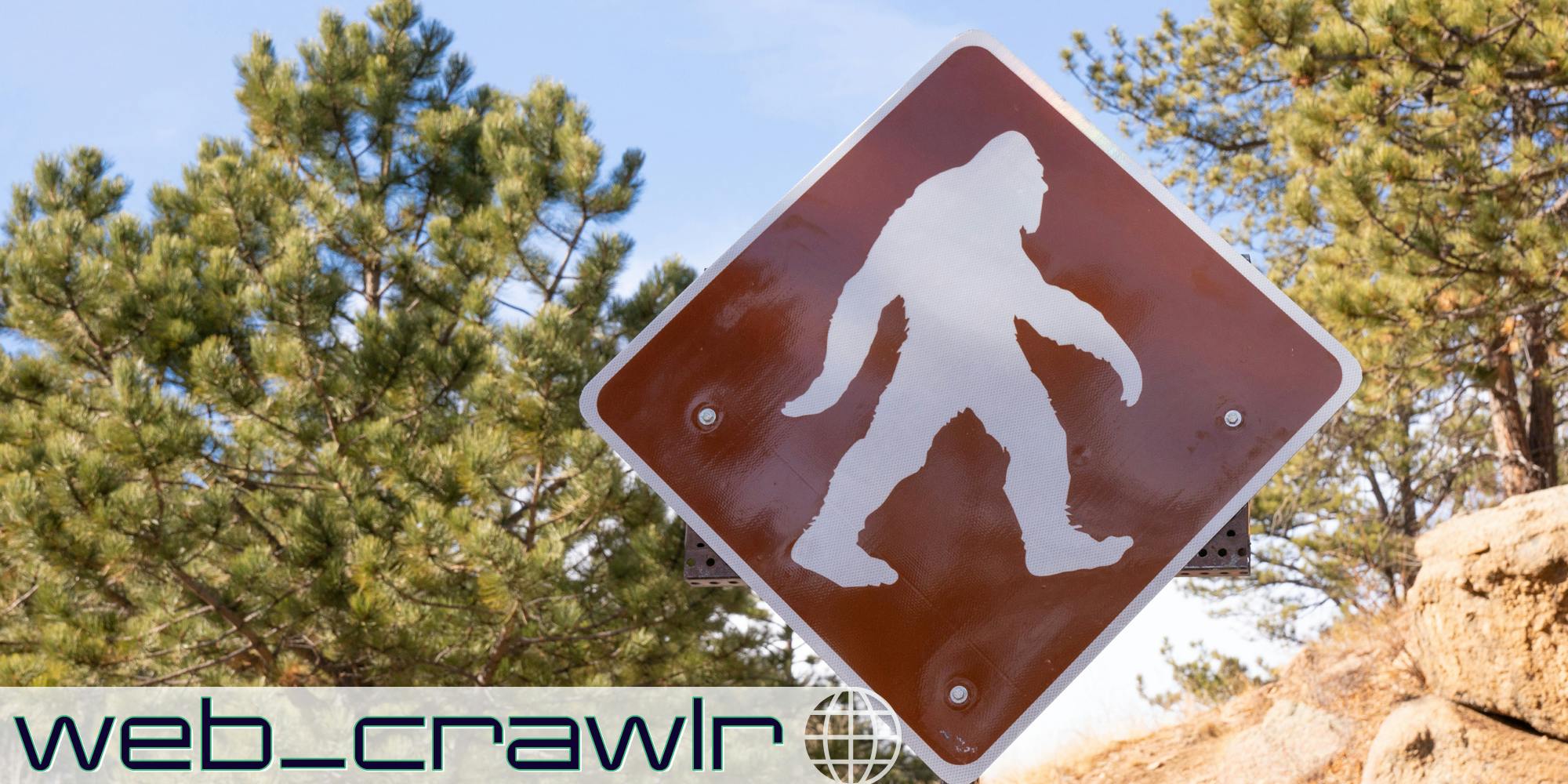 A Bigfoot crossing sign. The Daily Dot newsletter web_crawlr logo is in the bottom left corner.