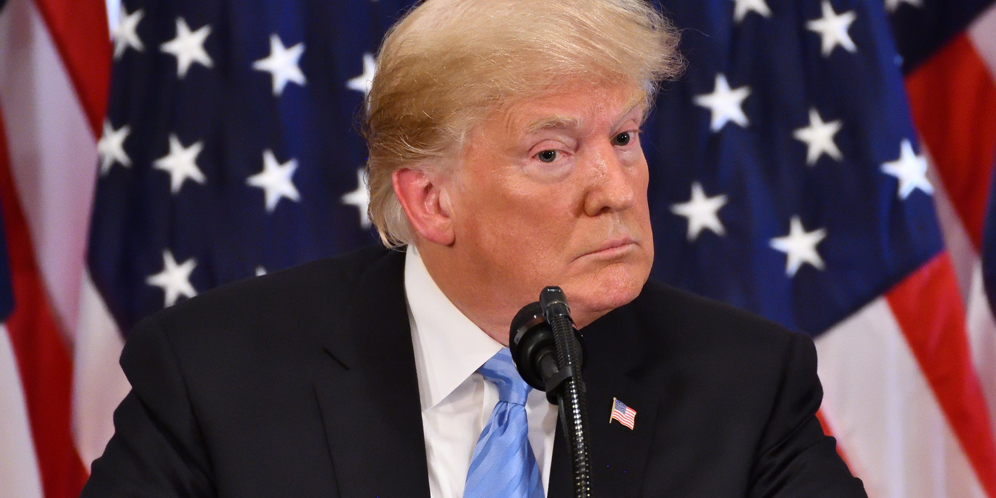 Donald Trump at a mic