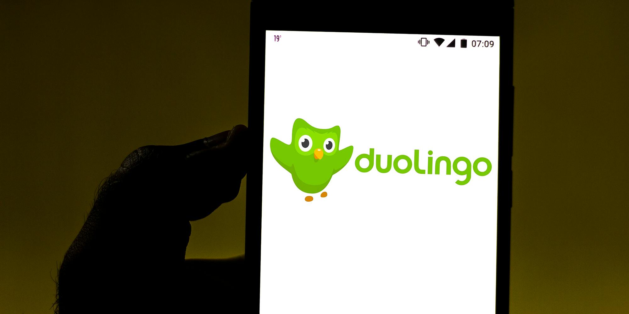 duolingo memes: In this photo illustration the Duolingo logo is displayed on a smartphone.