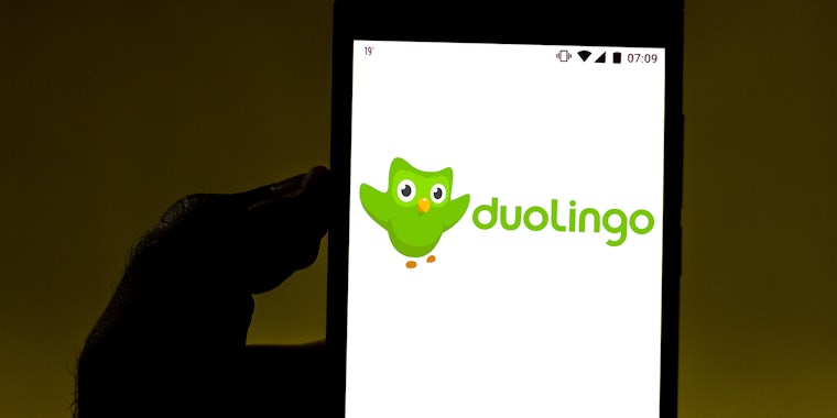 In this photo illustration the Duolingo logo is displayed on a smartphone.