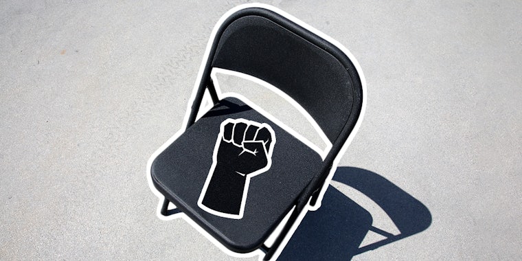 folding chair with fist silhouette on seat to illustrate folding chair meme story