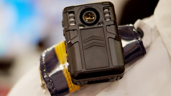 body worn camera to capture photos and video during law and order situations
