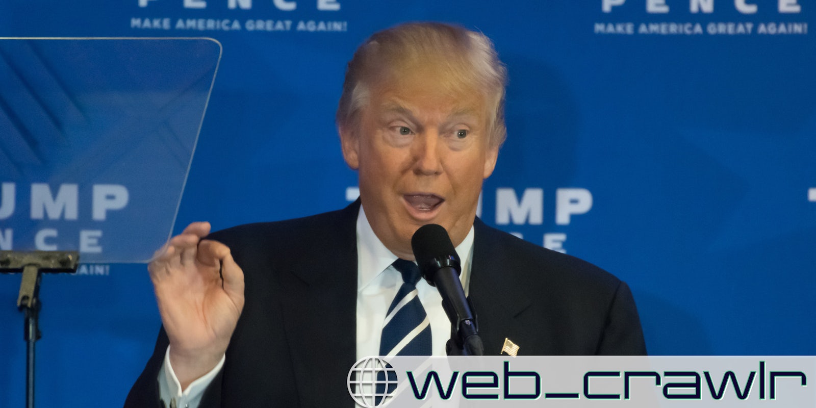 Donald Trump speaking into a mic. The Daily Dot newsletter web_crawlr logo is in the bottom right corner.