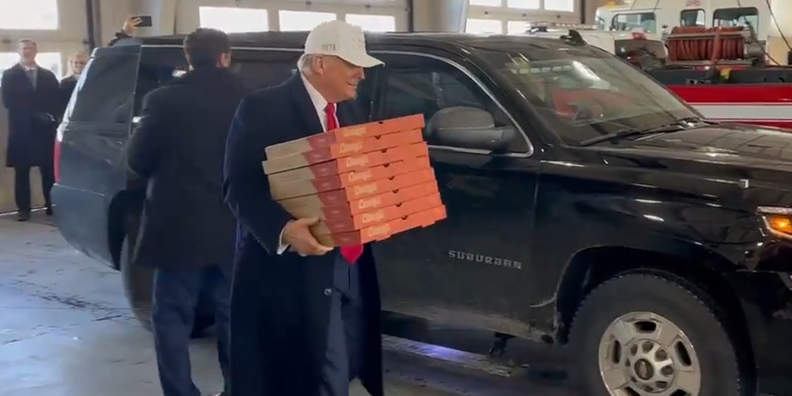 Trump carrying 8 pizza boxes has his fans gushing