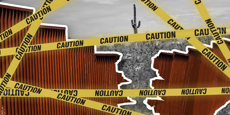 Border wall cracked in half with caution tape over it