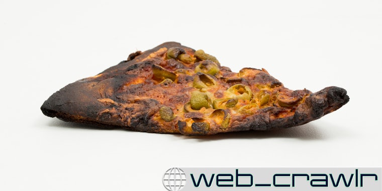 A slice of pizza that is burned. The Daily Dot newsletter web_crawlr logo is in the bottom right corner.