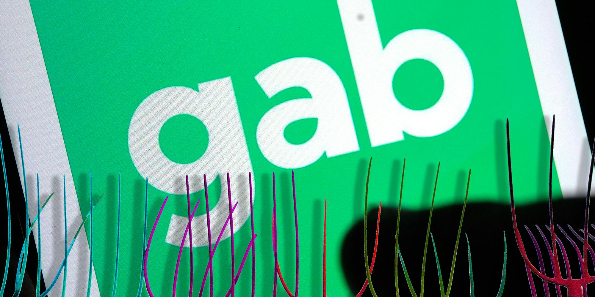 Gab app with pitchforks in front of it