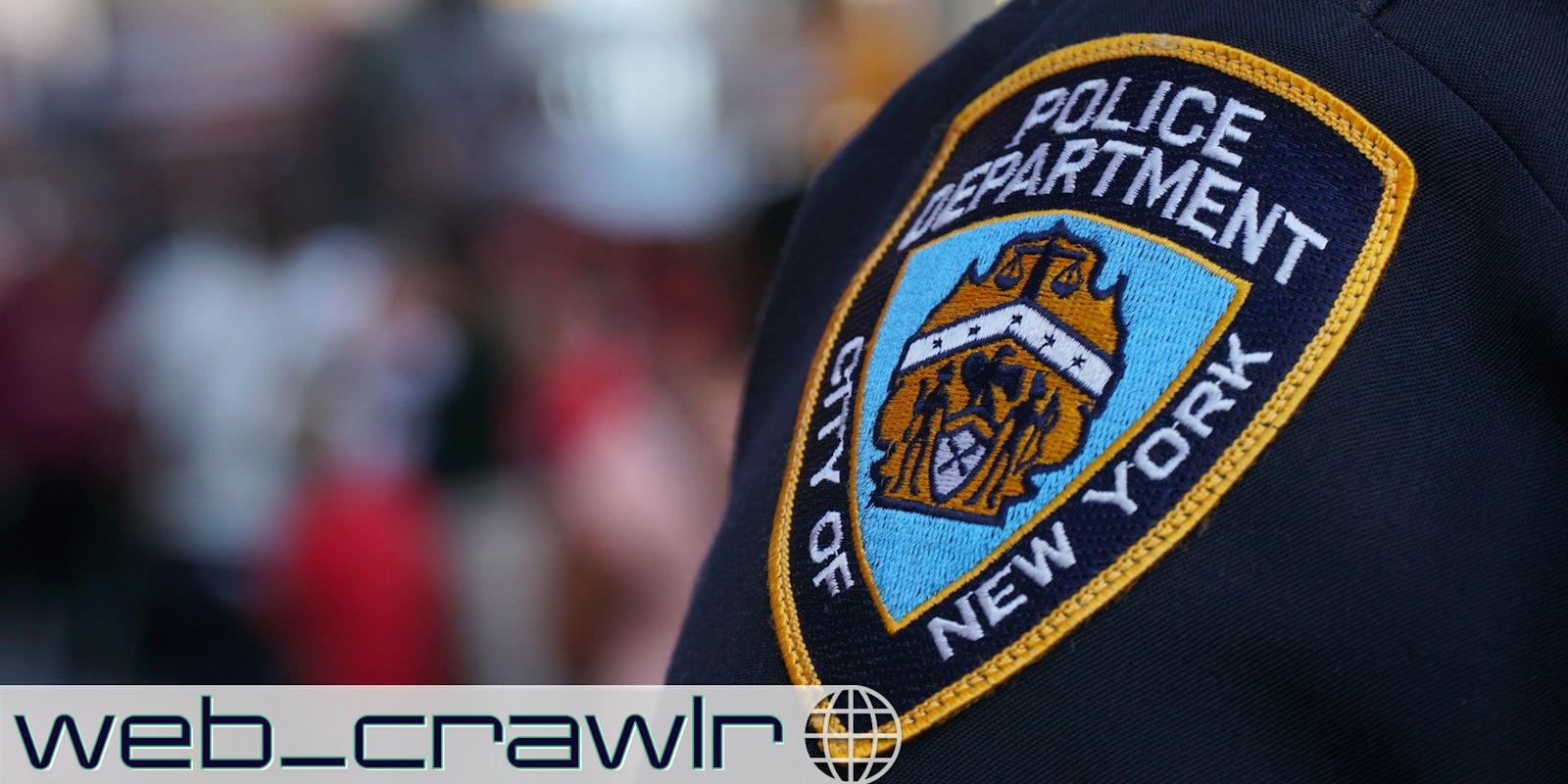 A NYPD patch. The Daily Dot newsletter web_crawlr logo is in the bottom left corner.