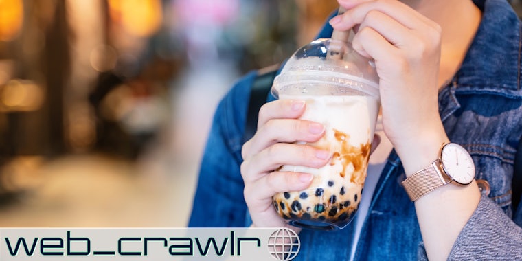 A person drinking a bubble tea. The Daily Dot newsletter web_crawlr logo is in the bottom left corner.