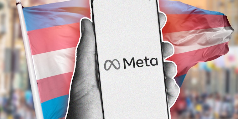 Hand holding phone that says meta over trans flag