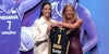Caitlin Clark holding Indiana Fever Jersey
