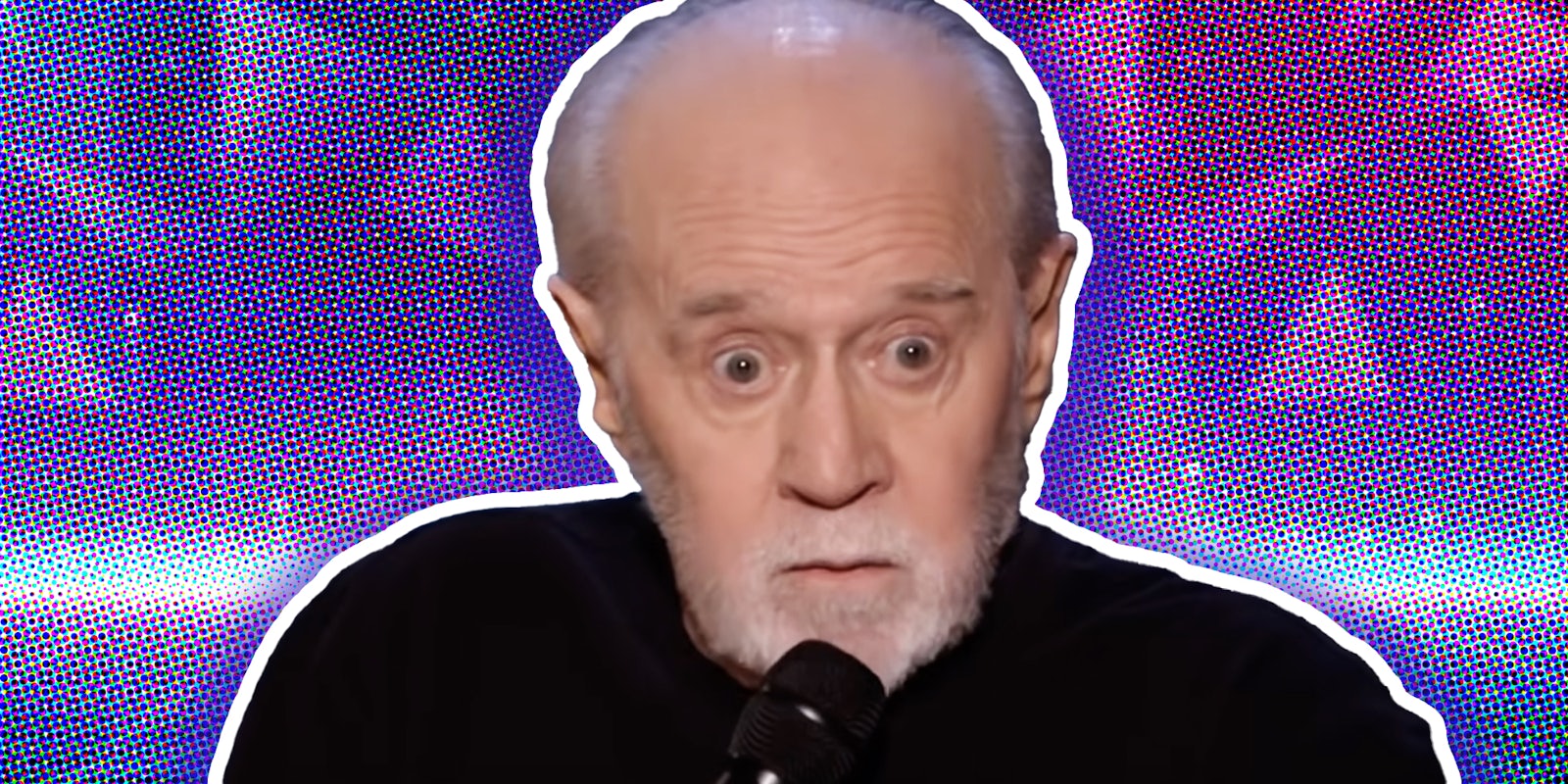 George Carlin in front of abstract background