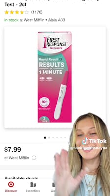 young woman with pregnancy test