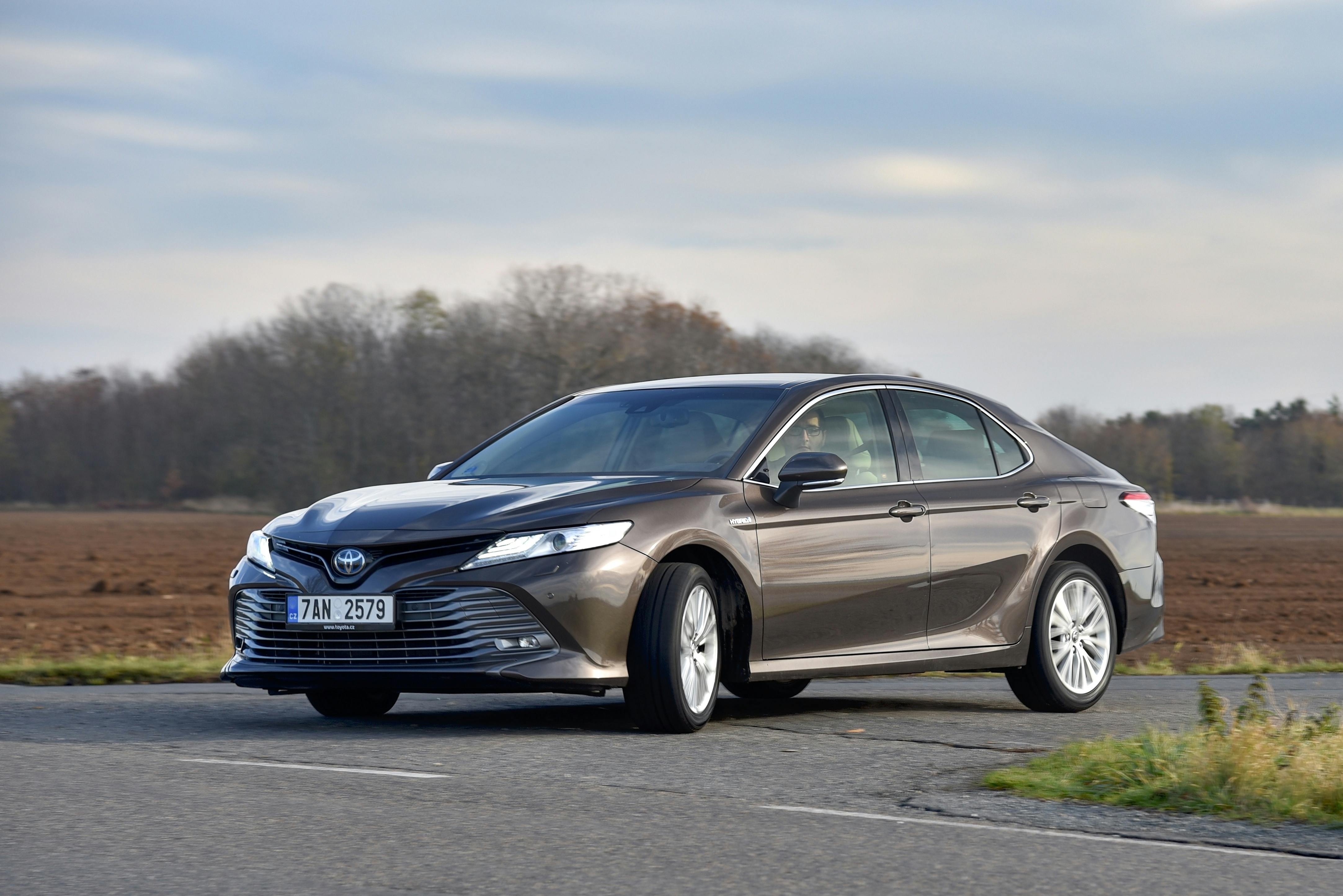 Toyota Camry - hybrid. Car while driving